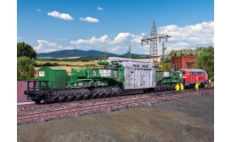 Wagon specjalny MAN Uaai 687.9 z ładunkiem generatora